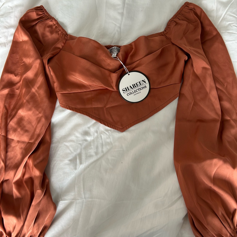 Orange blouse with padded cups size 8
